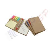 caderno com caneta e blocos adesivados